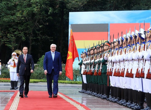 Le Président organise une cérémonie officielle de bienvenue pour son homologue allemand - Ảnh 2.